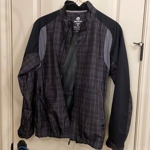 Sunice golf rain jacket size L only worn a couple of times . Black and grey